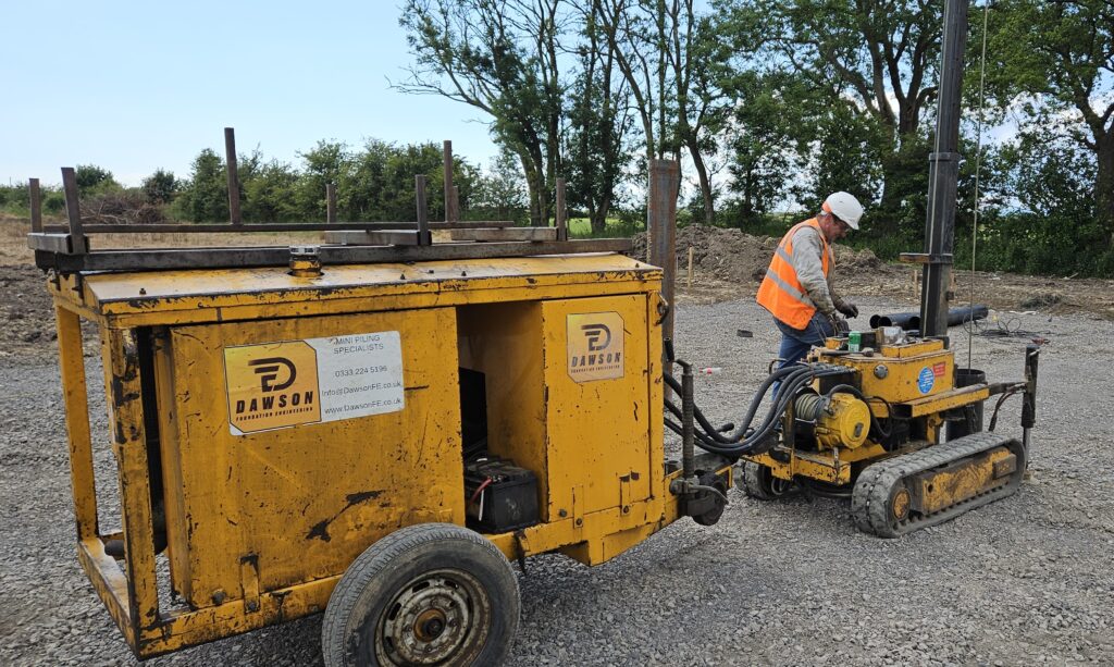 Bottom driven steel cased piles