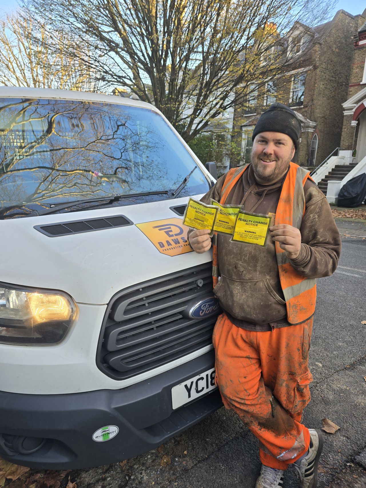 Oliver getting a parking ticket in London whilst doing bottom driven piling works in Camden