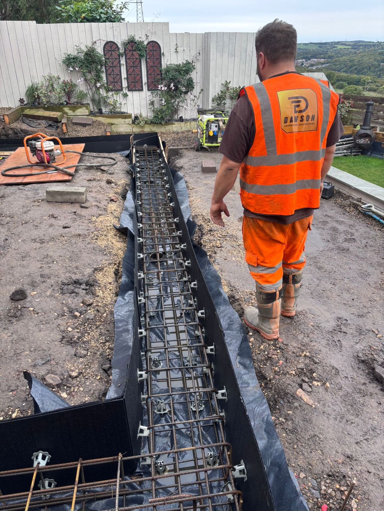 Piling prep, digging out and putting casing in place